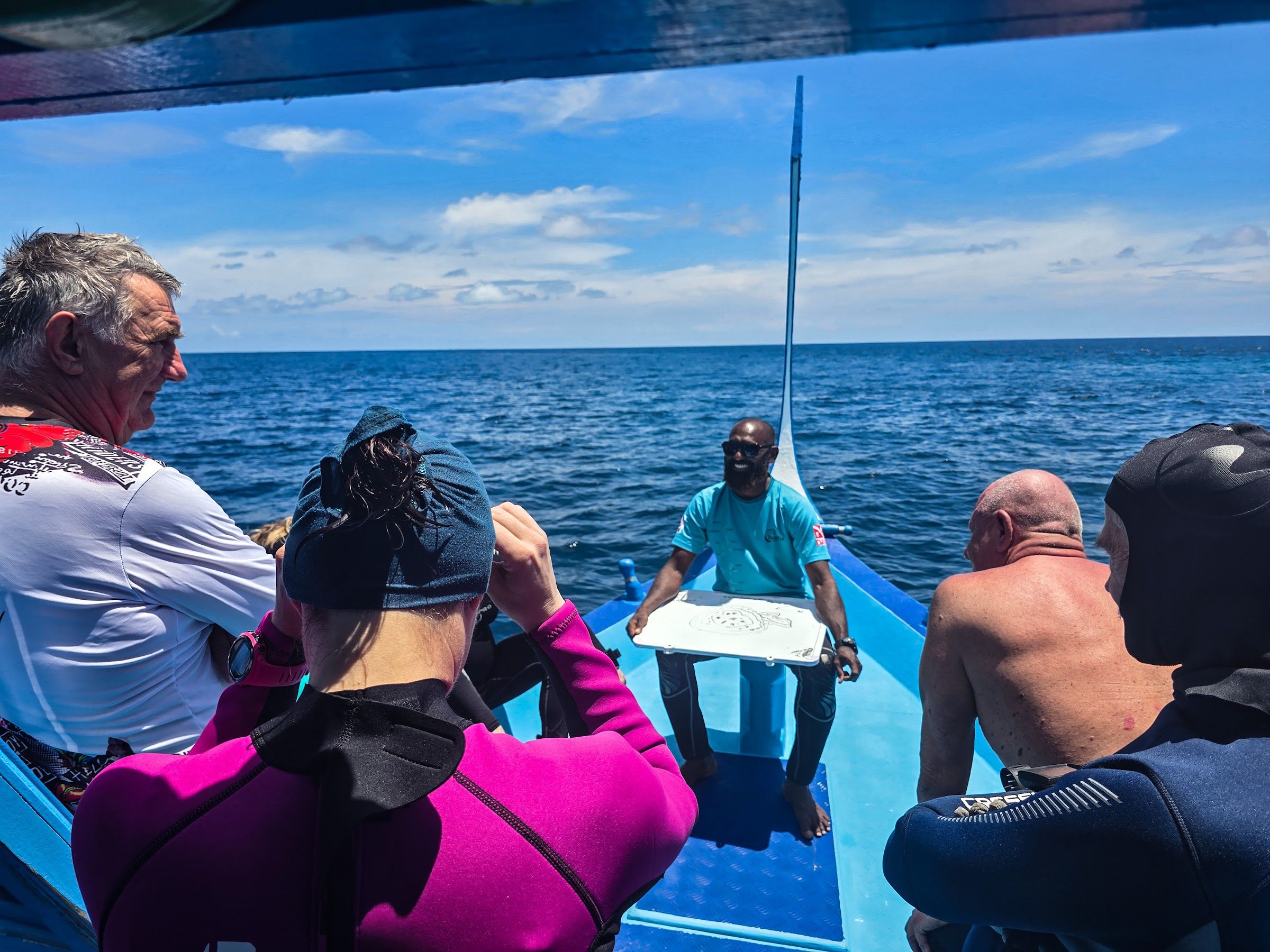 Guests on the dive boat heading out